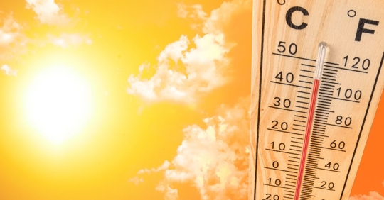 thermometer showing rising temperature