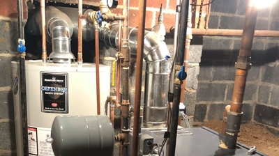 250,000 BTU per Hour Boiler and a 40 Gallon Hot Water Heater Photo